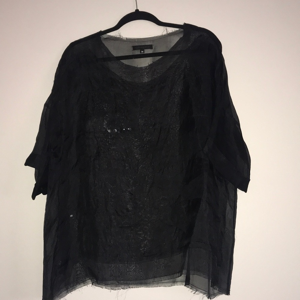 Sheer black sequined blouse by Louisa Babouryan